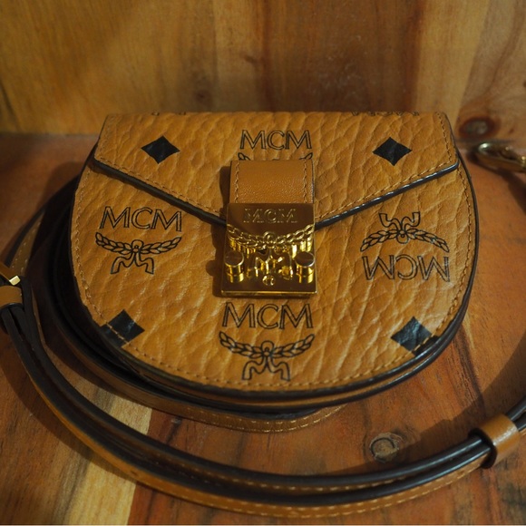 Selling this gorgeous authentic leather MCM wallet on strap - Picture 2 of 3